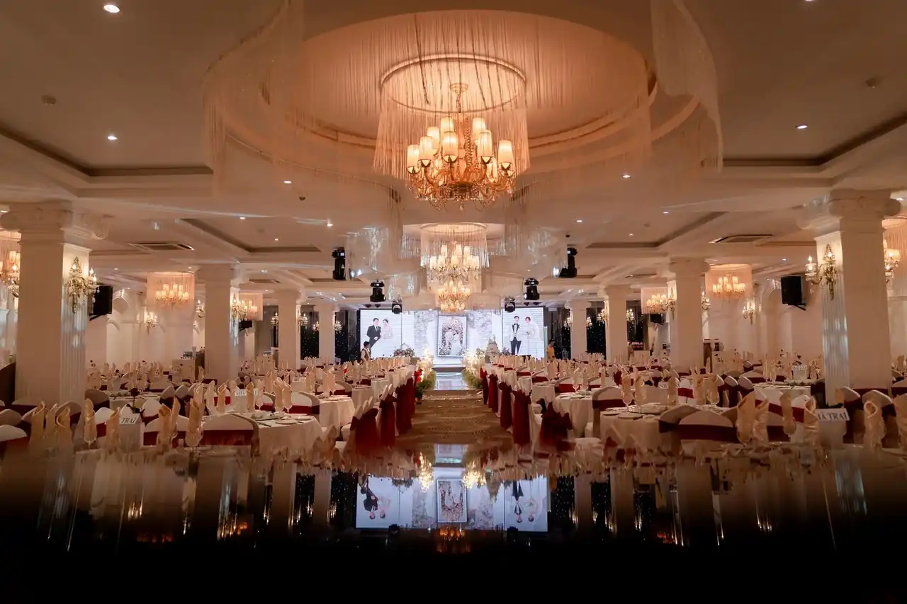 Luxurious ballroom illuminated by grand chandeliers for an evening gala