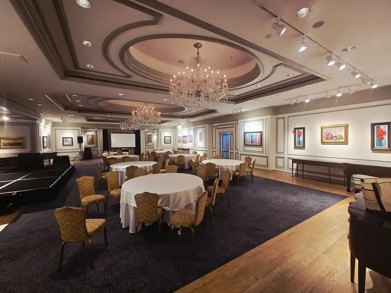 Elegant table setting with floral centerpieces in the Grand Ballroom